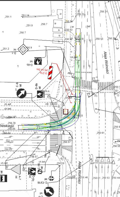 Plan sytuacyjny skrzyżowania ulic z naniesionymi oznaczeniami infrastruktury drogowej i nazwami ulic.
