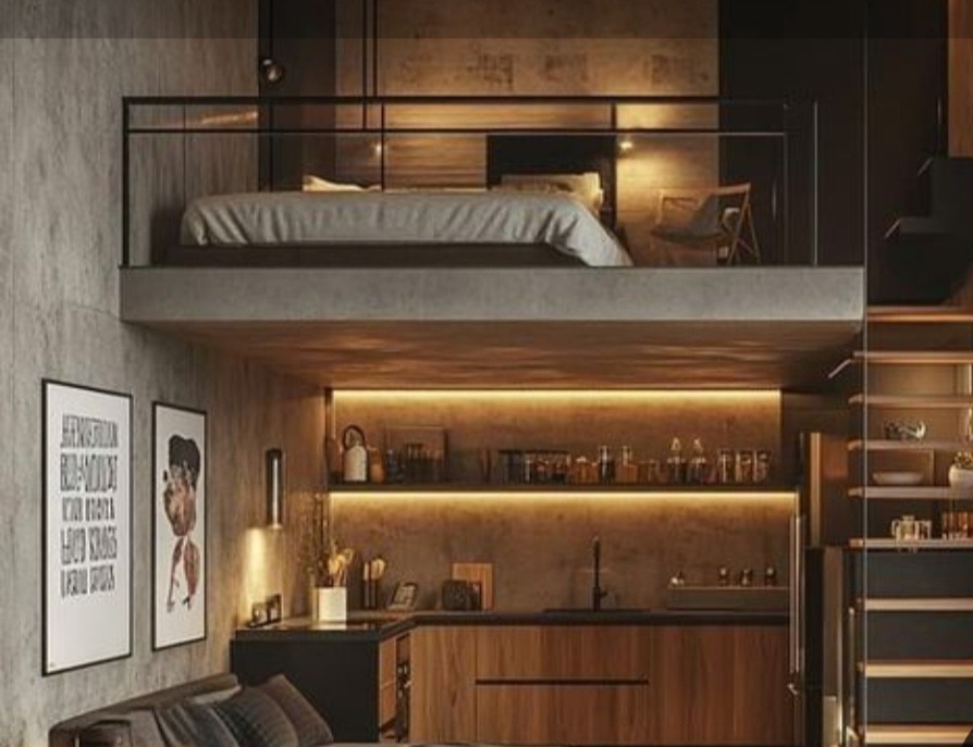 Dwupoziomowe mieszkanie w stylu loft z sypialnią na antresoli, oświetleniem LED pod szafkami kuchennymi i minimalistycznymi plakatami na ścianie.