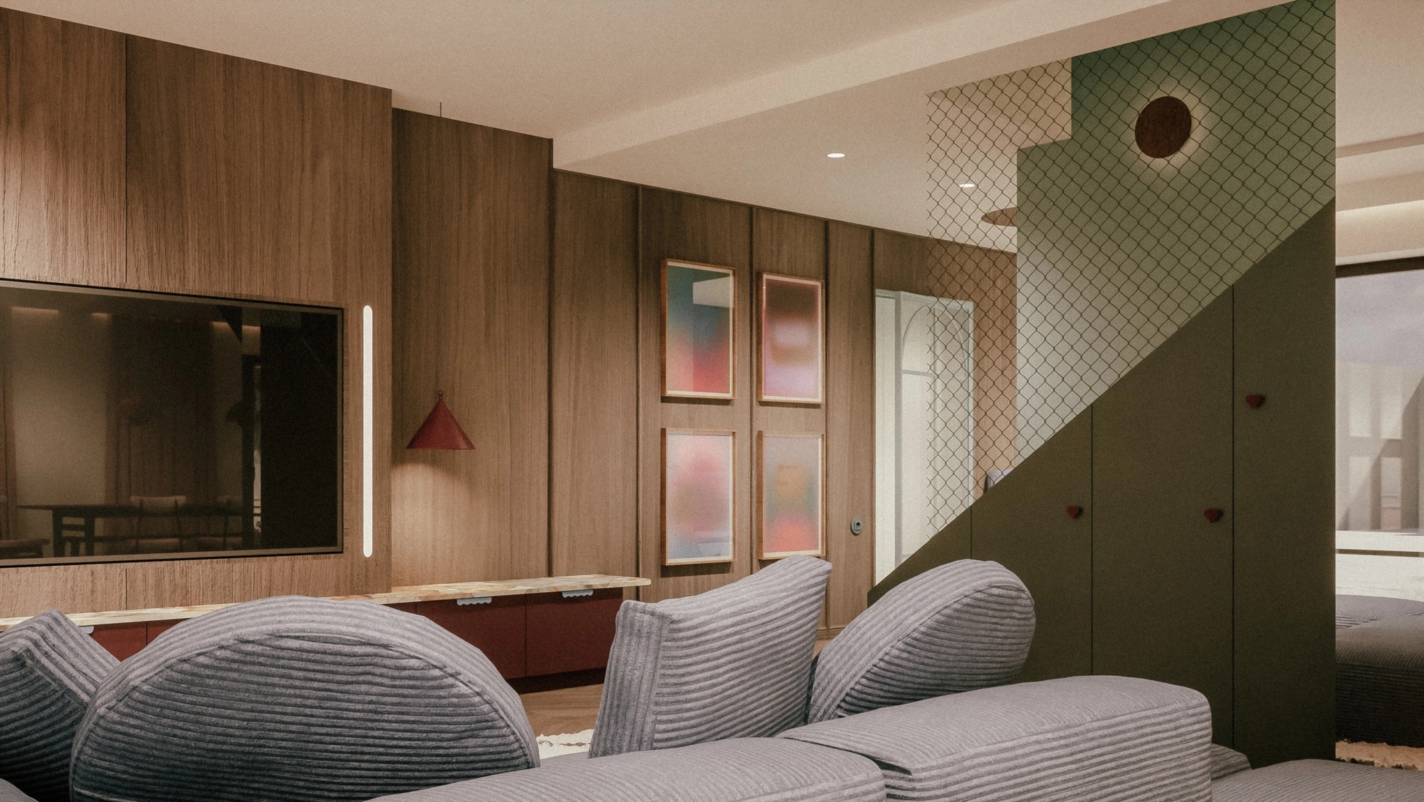 Nowoczesny salon z drewnianą boazerią, szarym modułowym narożnikiem, telewizorem i abstrakcyjnymi obrazami w ramach.