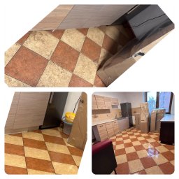 LAVIAN - Kuchnia z zabudową meblową w trakcie przeprowadzki, zabezpieczone meble kartonem i folią, podłoga w brązowo-beżową szachownicę.