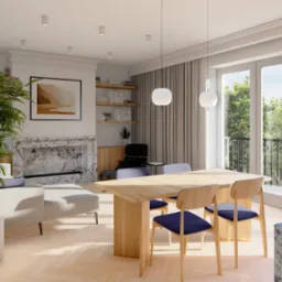 Jasny salon w Dębicy z drewnianym stołem i krzesłami z granatowymi siedziskami, marmurowym kominkiem i dużymi oknami balkonowymi z widokiem na zieleń.