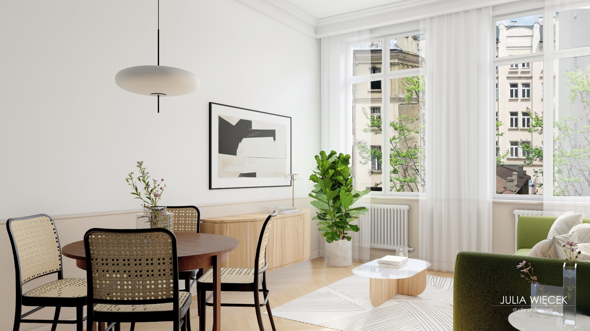 Jasne wnętrze mieszkania z okrągłym stołem jadalnym, rattanowymi krzesłami, abstrakcyjnym obrazem na ścianie i widokiem na kamienicę za oknem.