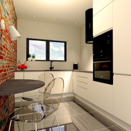DOMSTUDIO Nieruchomości Architektura Projektowanie - Wizualizacja nowoczesnej kuchni z białymi szafkami, czarnym piekarnikiem i okapem, ceglaną ścianą z zamontowaną lampą, okrągłym blatem i przezroczystymi krzesłami.