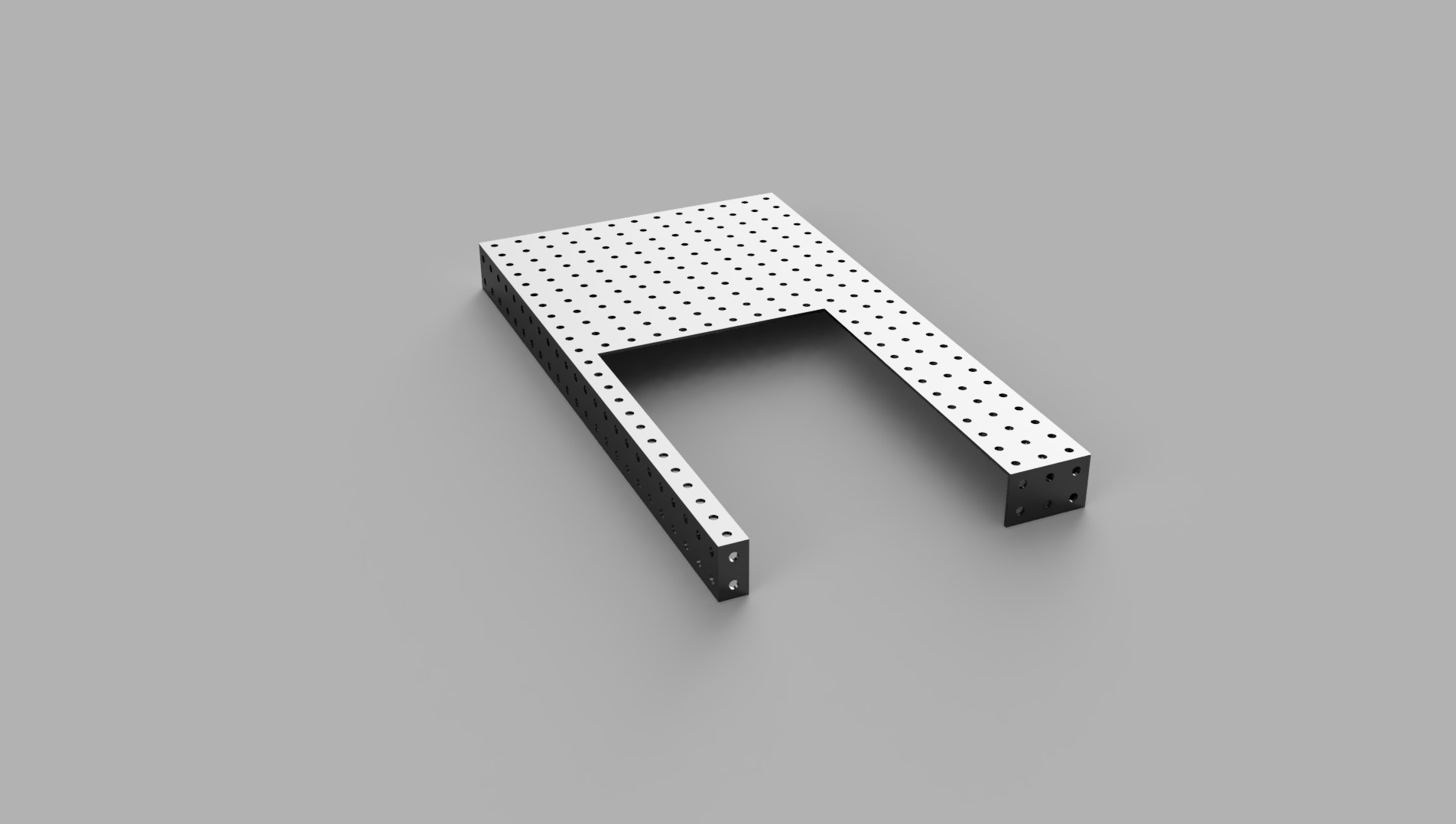 Metalowa płyta z otworami w kształcie litery U, prezentowana na szarym tle. Detal konstrukcyjny z Katowic, widok z góry.