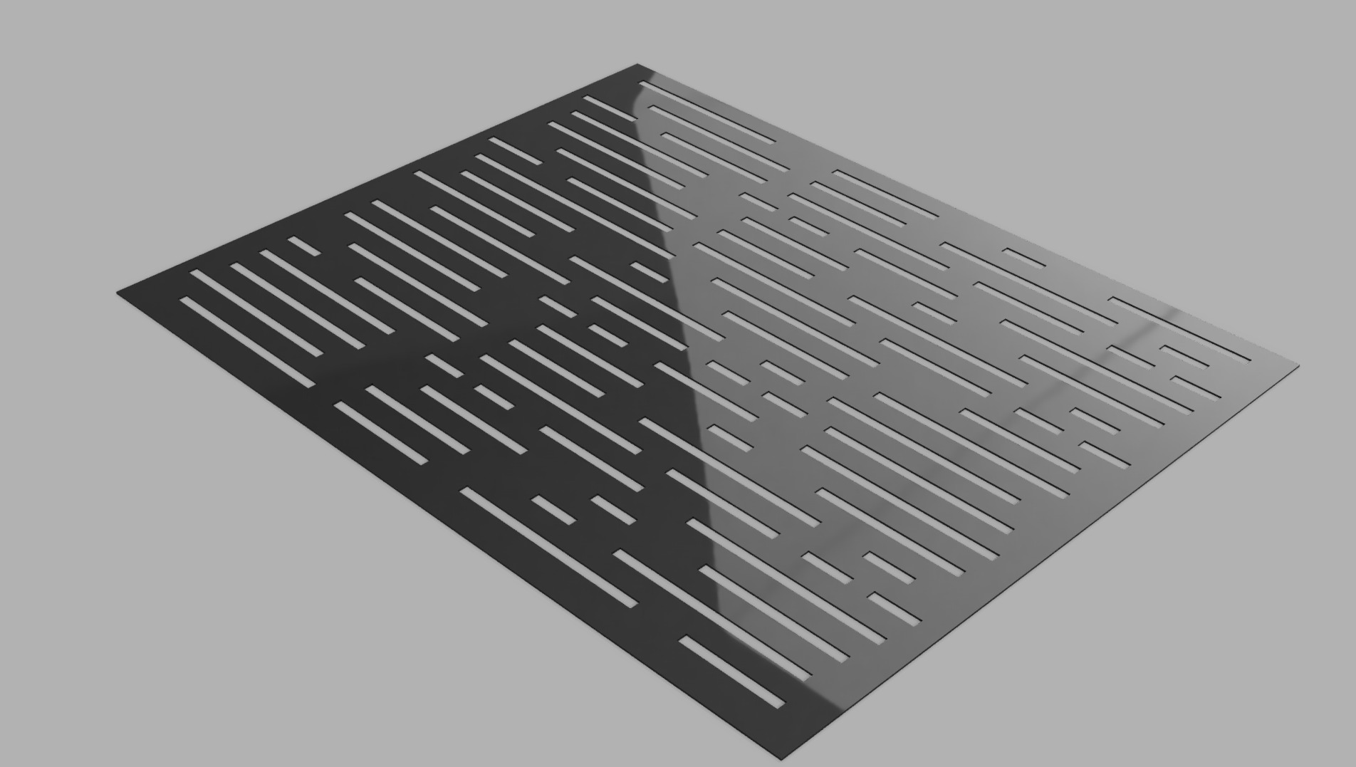 Czarna, perforowana płyta metalowa z abstrakcyjnym wzorem podłużnych otworów, leżąca ukośnie na szarym tle. Widoczny gradient cieniowania na powierzchni.