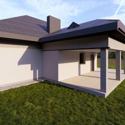 EK PROJEKT EWELINA KRAMARZ - Wizualizacja domu jednorodzinnego z tarasem, widok z zewnątrz na zielony trawnik i las w tle, nowoczesna architektura z elementami cegły i grafitowym dachem.