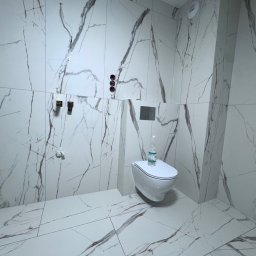 Rafal Chabiniak - Biała łazienka z marmurowymi płytkami, wisząca toaleta i bateria podtynkowa. Widoczne przyłącza wodne i odpływowe. Minimalistyczny design z butelką wody na sedesie.