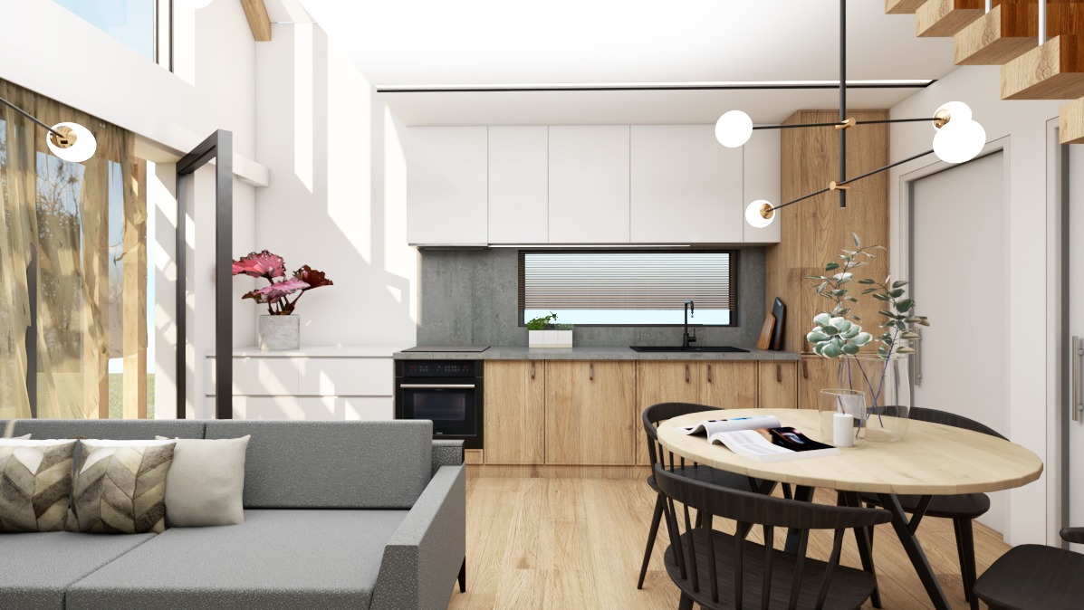 Nowoczesne wnętrze z szarą sofą, drewnianą podłogą i kuchnią w tle, oświetlone wiszącą lampą z kulistymi kloszami.