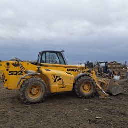 Ładowrka  z łyżką, widałmi lub koszem do transportu ludzi