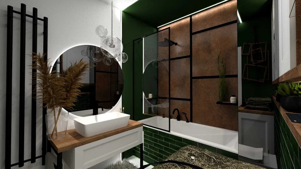 Nowoczesna łazienka z zielonymi akcentami: ciemnozielone płytki, ściana i dodatki, okrągłe lustro z podświetleniem, biała umywalka nablatowa na drewnianym blacie, czarna armatura i kabina...