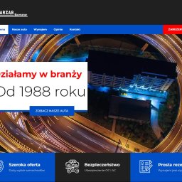 BGLAM sp. z o.o. - Strona internetowa firmy oferującej wynajem samochodów, z widokiem na nocną panoramę miasta i wielopoziomową autostradę w tle.