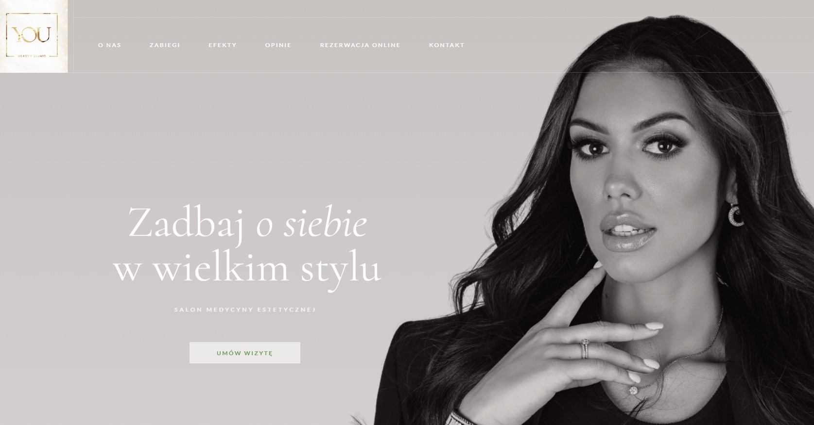 Strona internetowa salonu medycyny estetycznej z portretem kobiety w czerni i tekstem 'Zadbaj o siebie w wielkim stylu'.