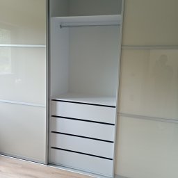 Tomasz Kuna Strefa Mebli - Szafa laminat drzwi przesuwne Raumplus wypełnienie drzwi lacobel szyba