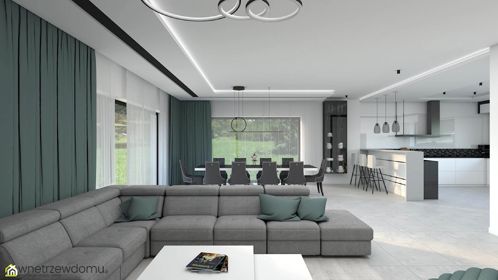 Przestronny salon z szarą sofą narożną, turkusowymi zasłonami i poduszkami, połączony z jadalnią i nowoczesną białą kuchnią z wyspą.