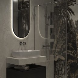 Interior Stories - Nowoczesna łazienka w Toruniu z umywalką nablatową, podświetlanym lustrem i kabiną prysznicową z motywem tropikalnym na ścianie.