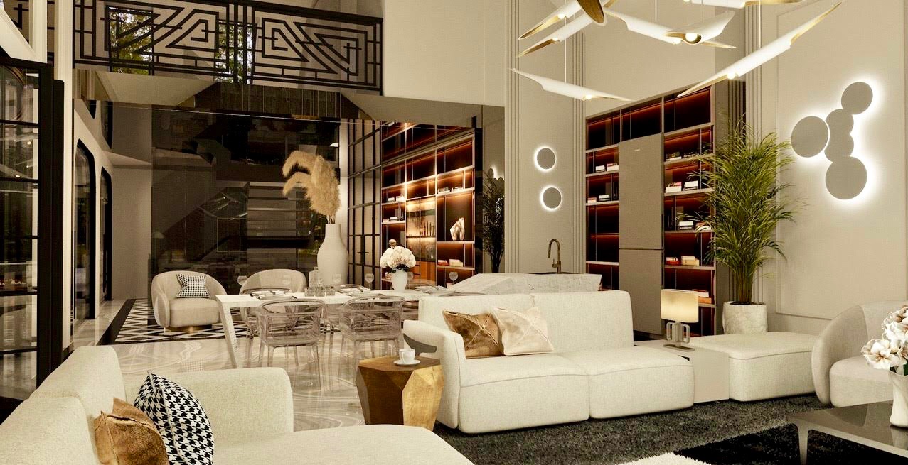 Jasne, przestronne wnętrze salonu z jadalnią, z białymi sofami, przezroczystymi krzesłami, marmurową podłogą i wysokimi regałami z oświetleniem, akcentowane nowoczesną lampą sufitową i roślinami...