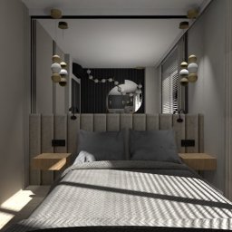 Le-Pa aranżacje wnętrz JOANNA MICHALIK - Nowoczesna sypialnia z łóżkiem, tapicerowanym zagłówkiem, wiszącymi szafkami nocnymi i dekoracyjnym lustrem z kulistymi lampami po bokach, oświetlona promieniami słońca wpadającymi przez żaluzje.