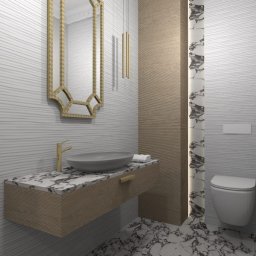 Le-Pa aranżacje wnętrz JOANNA MICHALIK - Nowoczesna łazienka z umywalką nablatową na marmurowym blacie, złota armatura, ozdobne lustro w złotej ramie i toaleta podwieszana na tle białych, falowanych płytek.