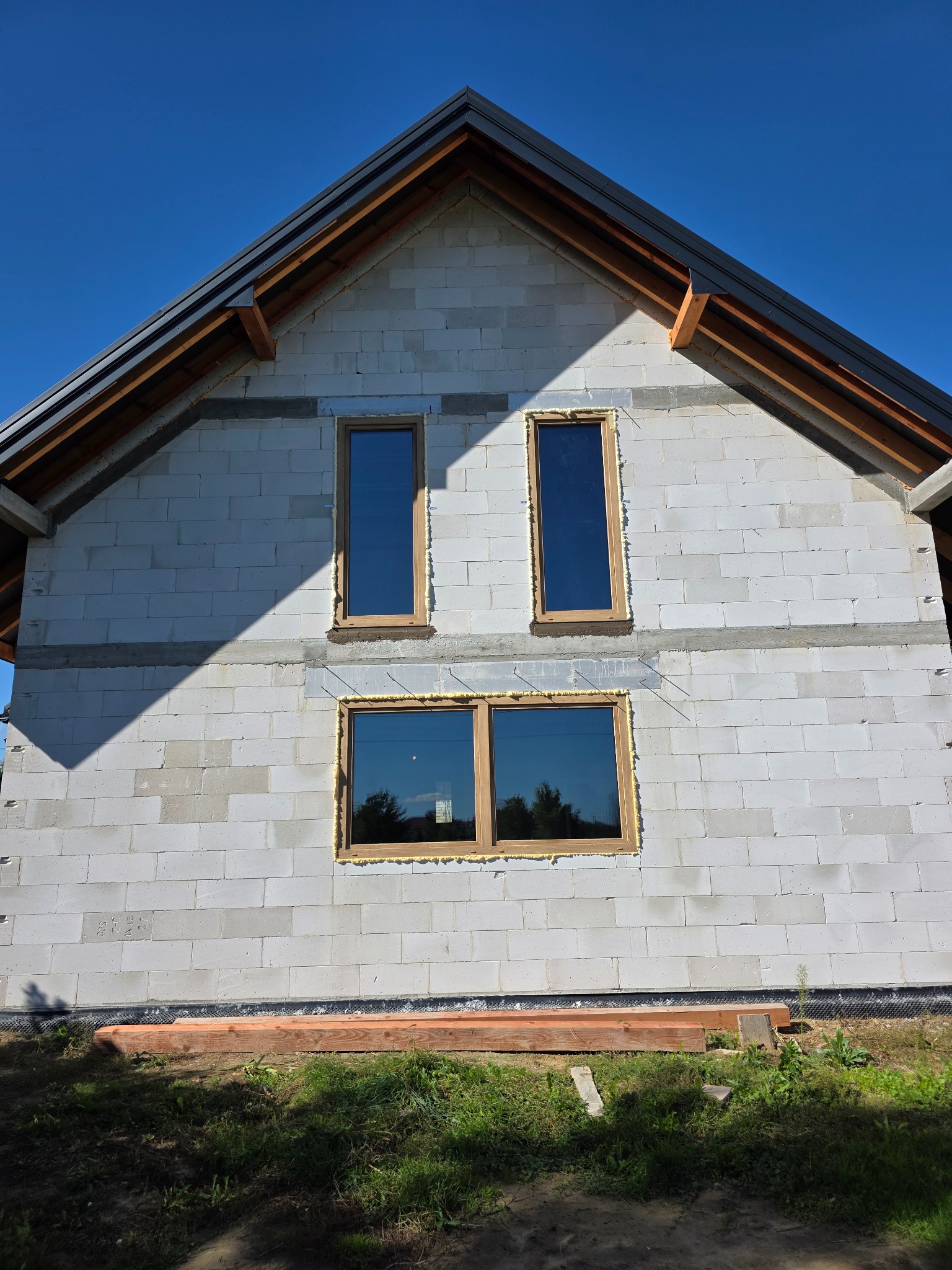 Stolarka okienna Kömmerling 88 MD obustronny Woodec z HST + Podwaliny zabezpieczone EDPM