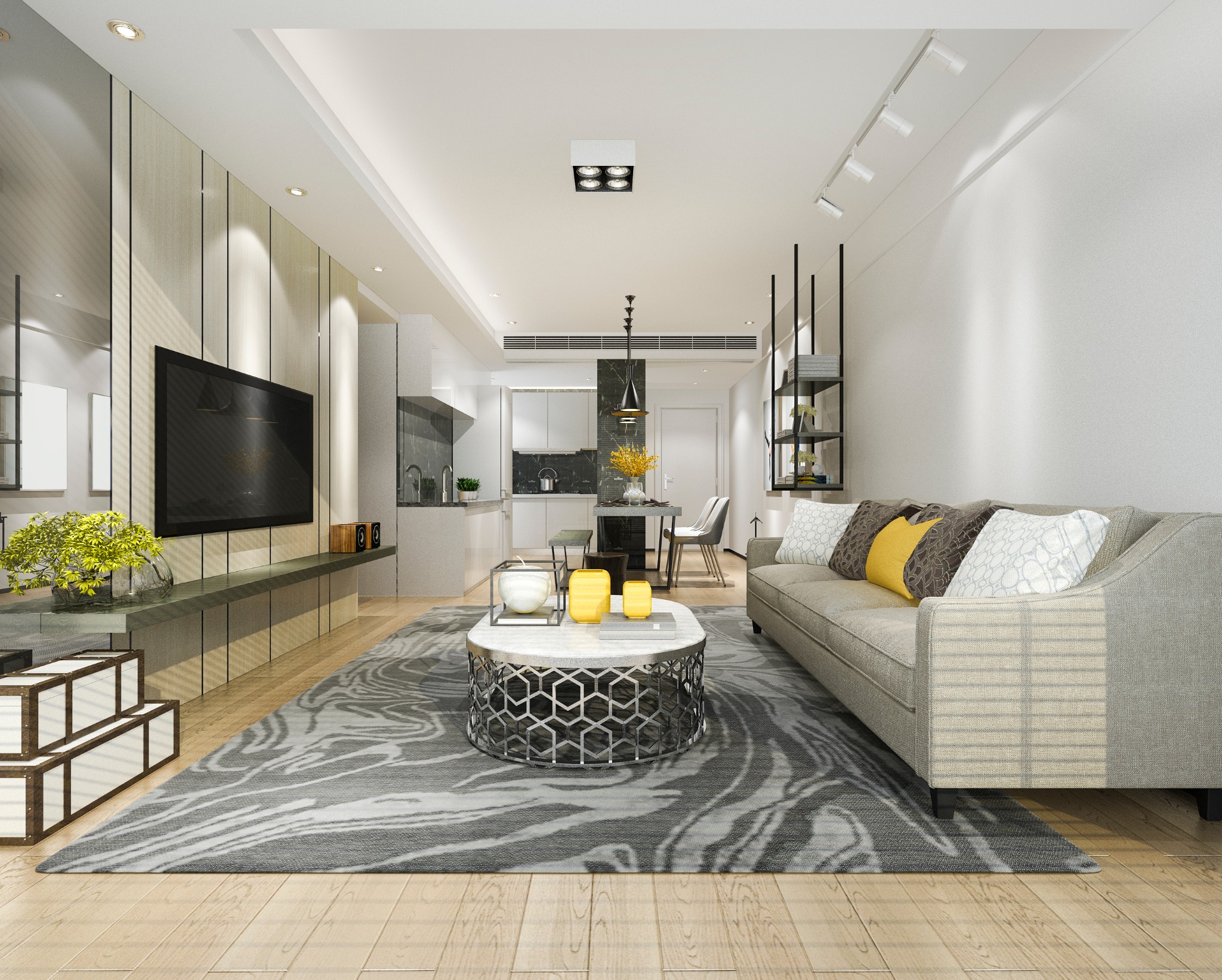 Jasne, przestronne wnętrze mieszkania z salonem i aneksem kuchennym. W salonie szara sofa z dekoracyjnymi poduszkami, stolik kawowy z marmurowym blatem i metalową podstawą, dywan w odcieniach...