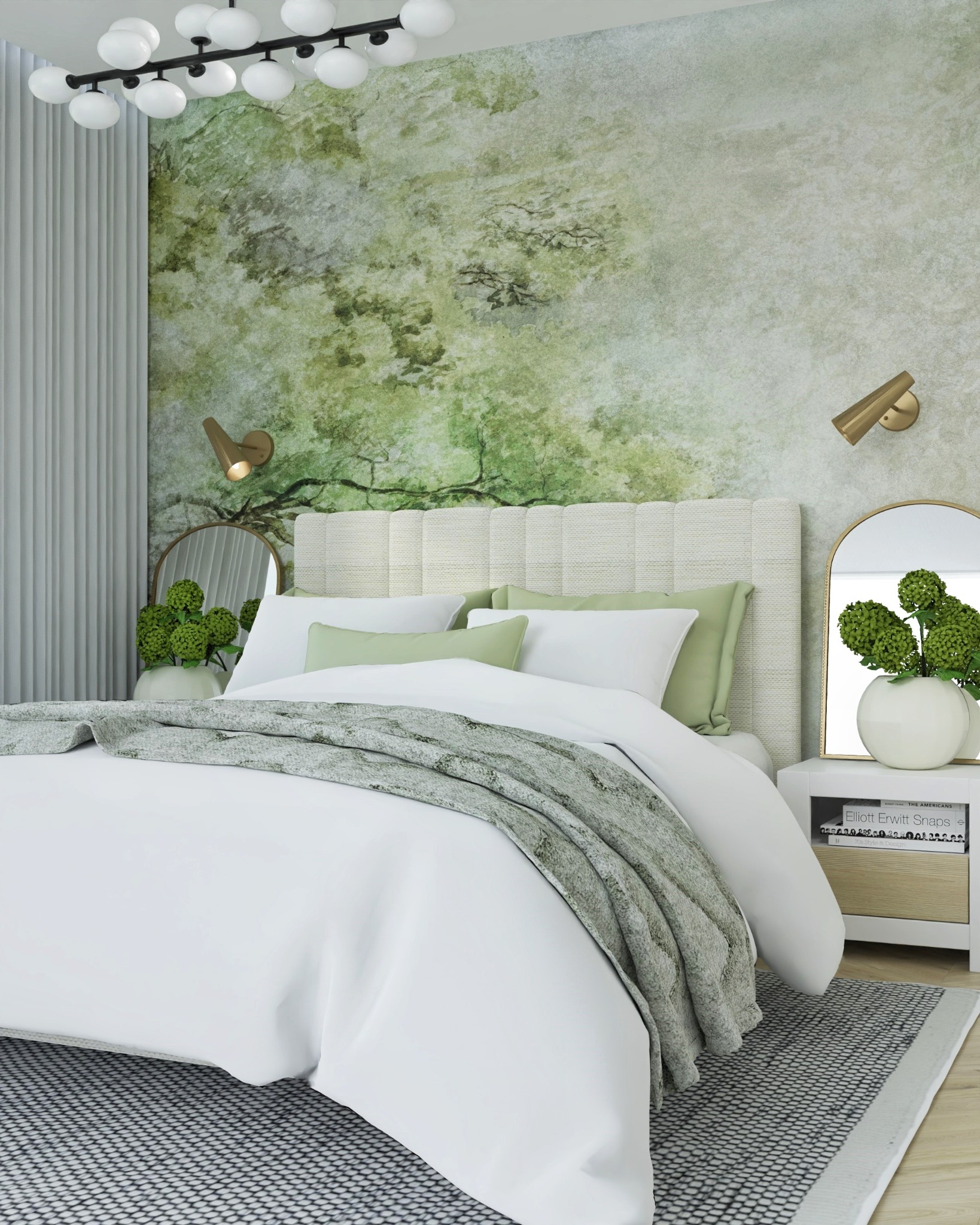 Jasna sypialnia z łóżkiem, zielonymi akcentami i ścianą z motywem drzewa, oświetlona lampami ściennymi i sufitową lampą z kulistymi kloszami.
