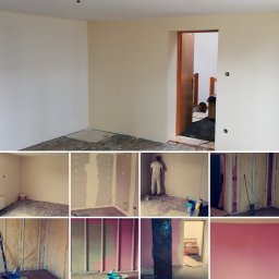 Piotrek Jonienc - Wnętrze w trakcie prac wykończeniowych: częściowo pomalowane ściany, widoczne fragmenty podłogi, instalacja elektryczna w ścianach, pracownik w kombinezonie malarskim w tle, otwarte drzwi do innego...