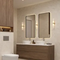 Nowoczesna łazienka z dwoma umywalkami nablatowymi, podświetlanymi lustrami w czarnych ramach, drewnianą szafką pod umywalkami oraz wiszącą toaletą w jasnej tonacji.