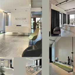 Nowoczesne wnętrze biura: minimalistyczna recepcja z logo, strefa relaksu z fotelami, sala konferencyjna i dekoracje z mchu. Jasne, przestronne pomieszczenie.