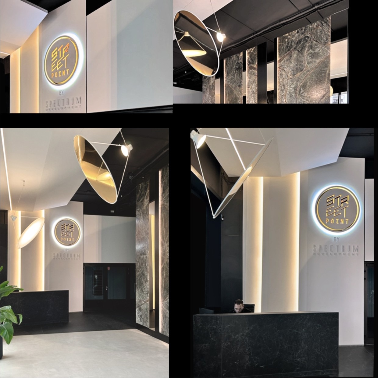 Nowoczesne lobby biurowca z marmurowymi kolumnami, designerskim oświetleniem i recepcją z ciemnego kamienia. Minimalistyczny styl z elementami złota i wyraźnym logo firmy.