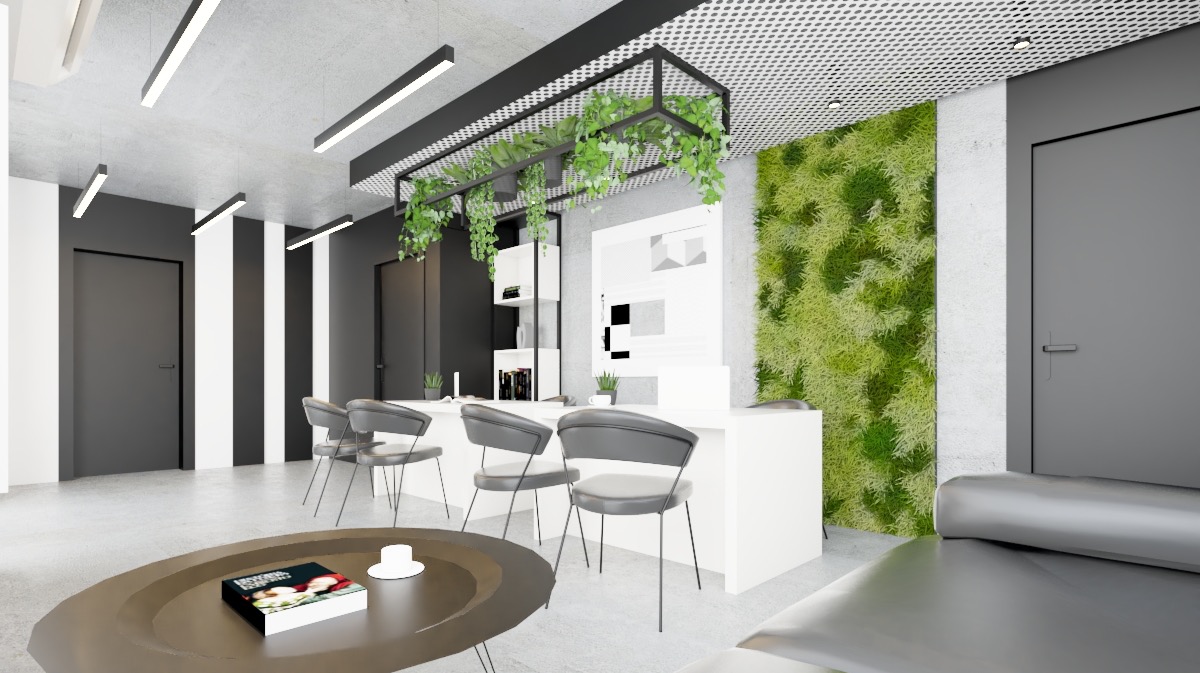 Nowoczesne wnętrze biurowe w Krakowie z zieloną ścianą, minimalistycznymi krzesłami i okrągłym stolikiem kawowym z książką i filiżanką.