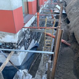 Odkopywanie fundamentow, izolacja przeciwwilgociowa, ocieplenie 