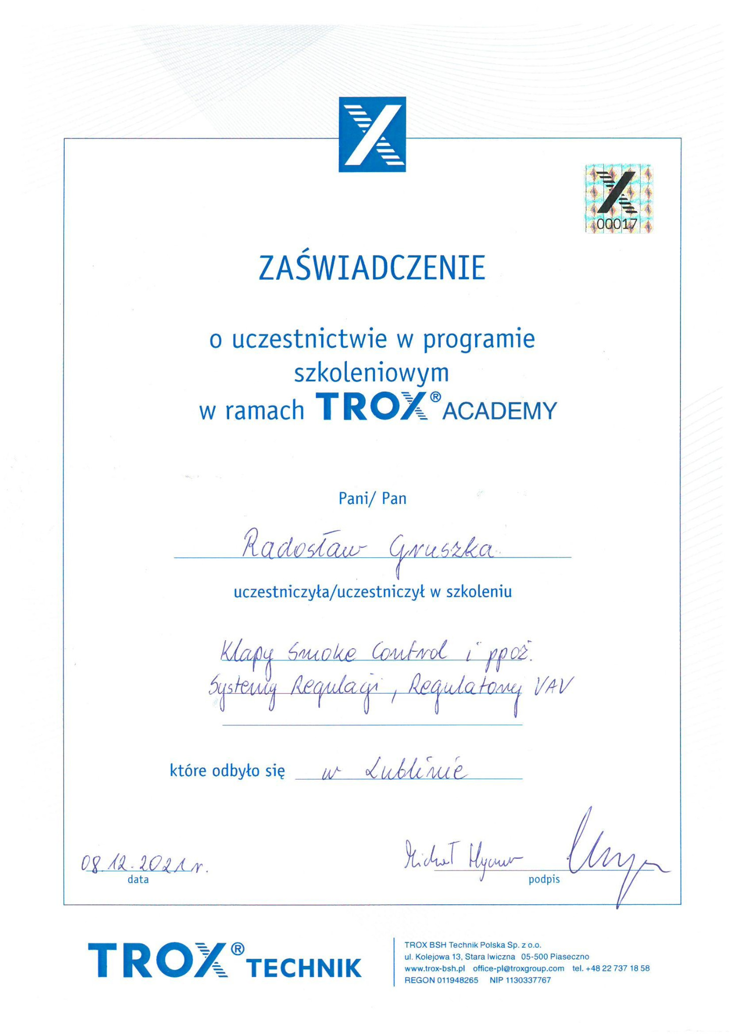 Zaświadczenie o ukończeniu szkolenia TROX Academy z zakresu klap dymowych i systemów regulacji VAV, podpisane przez Radosława Gruszkę i Richarda Hycnera.