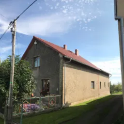 Kompleksowa wymiana pokrycia wraz z wymurowaniem trzech kominów z cegły klinkierowej