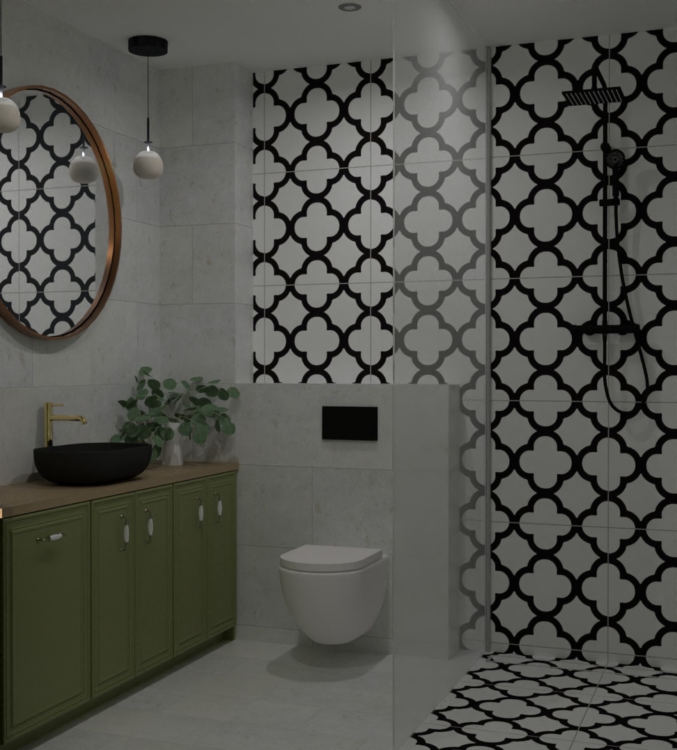 Nowoczesna łazienka z zieloną szafką pod umywalką, okrągłym lustrem w miedzianej ramie i czarno-białymi płytkami w marokański wzór na ścianach i podłodze w strefie prysznica.