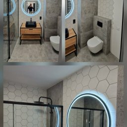 BIPI-BUD Bartłomiej Pazdro - Nowoczesna łazienka z heksagonalnymi płytkami, okrągłym lustrem z podświetleniem LED, czarną umywalką nablatową na drewnianej szafce z metalowym stelażem oraz kabiną prysznicową typu walk-in...