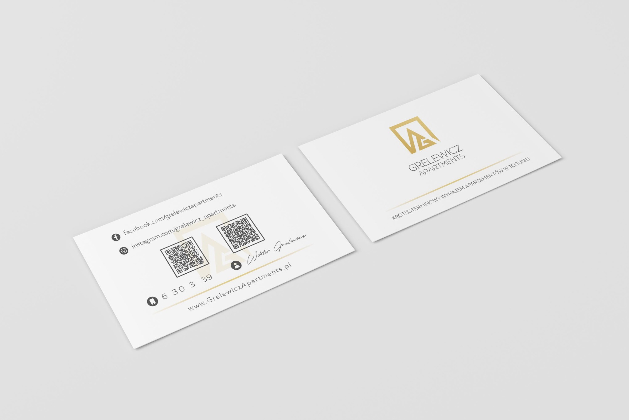 Dwie wizytówki Grelewicz Apartments na jasnym tle. Jedna z QR kodami i danymi kontaktowymi, druga z logo i hasłem 'Krótkoterminowy wynajem apartamentów w Toruniu'.