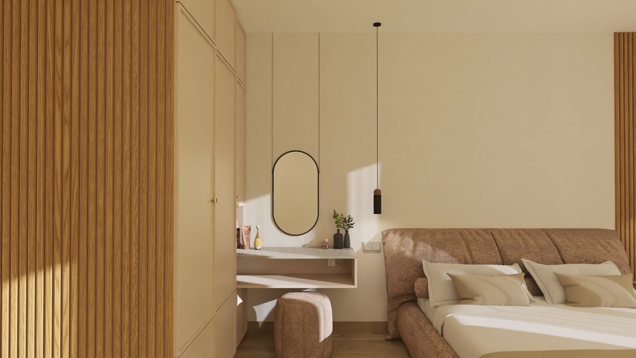 Beżowa sypialnia z drewnianymi lamelami, toaletką z owalnym lustrem i pufem. Minimalistyczna lampa wisząca nad wezgłowiem łóżka. Jasne, ciepłe wnętrze.