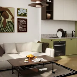 Stylowe wnętrze: jasna sofa z poduszkami, stolik kawowy z owocami, zielona zabudowa kuchenna z piekarnikiem i minimalistyczne dekoracje ścienne.