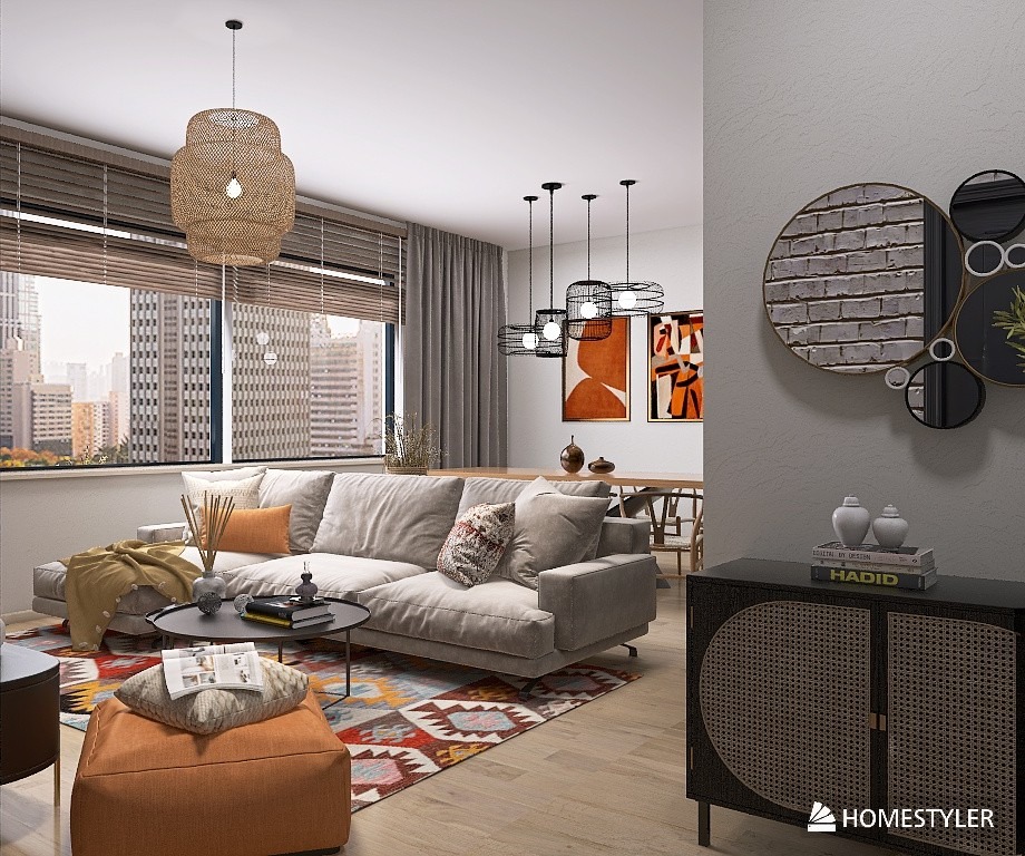 Jasny salon z szarą sofą narożną, wzorzystym dywanem, rattanową lampą wiszącą i czarną komodą z okrągłymi rattanowymi panelami, dekoracyjnym lustrem i widokiem na miasto za oknem.