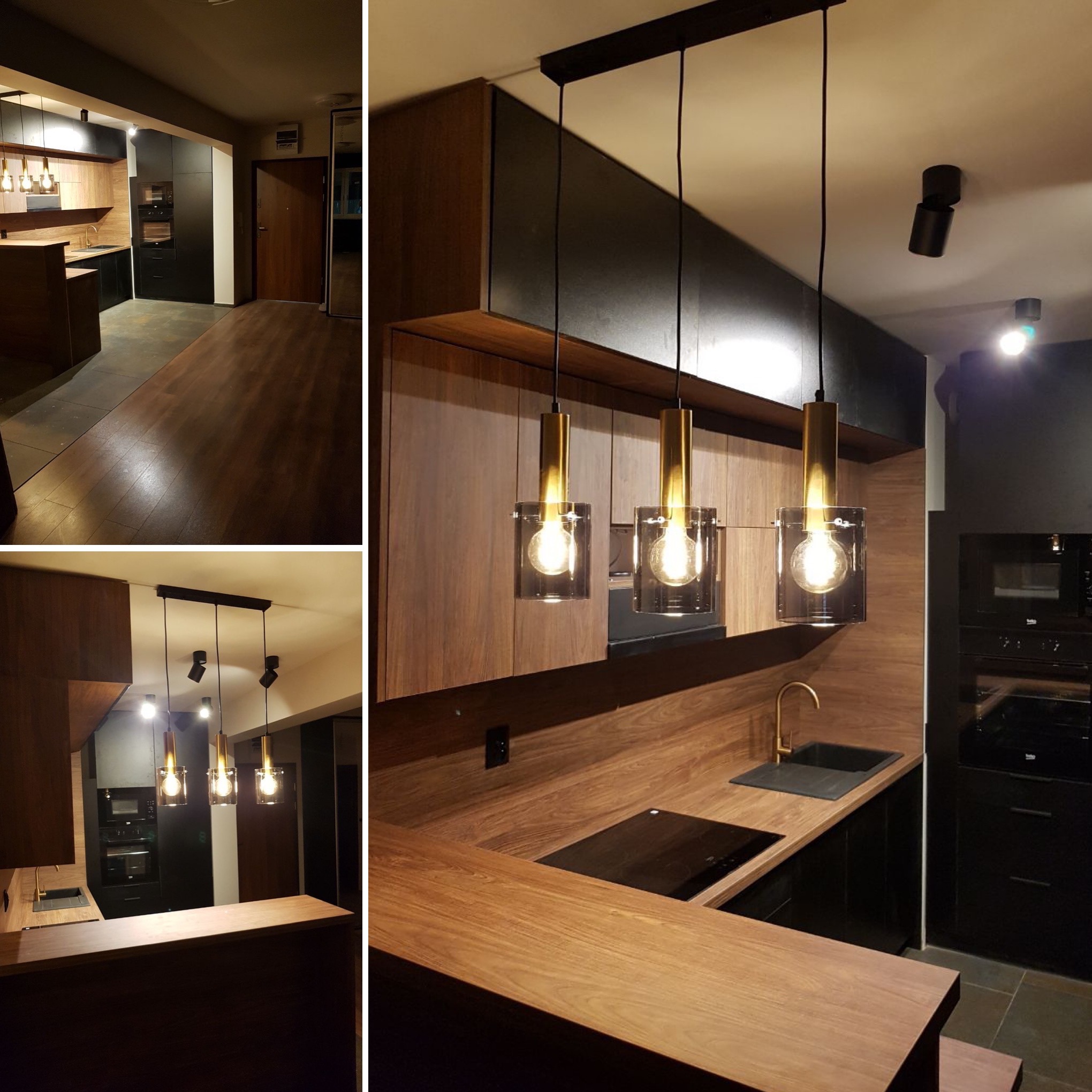 Nowoczesna kuchnia z drewnianymi szafkami, czarnymi akcentami i złotą armaturą, oświetlona trzema wiszącymi lampami z przezroczystymi kloszami i żarówkami Edisona.
