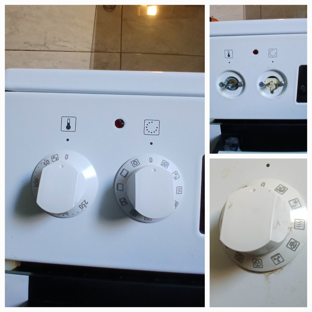 Biała kuchenka z dwoma pokrętłami, jedno zdjęte, ukazując mechanizm. Widoczne zabrudzenia i resztki jedzenia. Ujęcie z bliska, skupione na detalach.