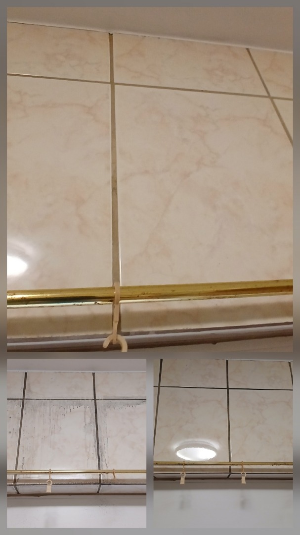 Zdjęcie 'przed i po' czyszczenia fug na beżowych płytkach ściennych z marmurkowym wzorem, z widoczną złotą listwą i uchwytami na akcesoria.