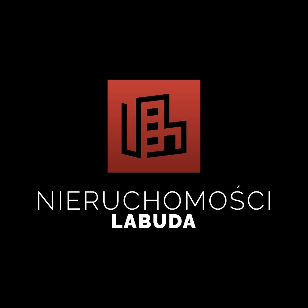 Logo firmy Nieruchomości LABUDA: stylizowany budynek w czerwonym kwadracie na czarnym tle.