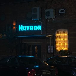 SANITECH SPÓŁKA Z OGRANICZONĄ ODPOWIEDZIALNOŚCIĄ - Logo Havana Żary w nocy
