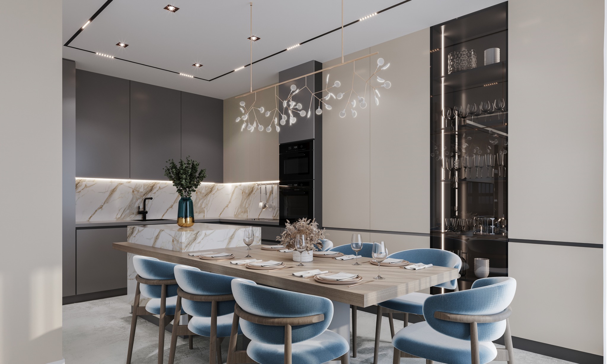 Nowoczesna jadalnia z blatem wyspowym z marmurowym wzorem, oświetlona designerską lampą z mlecznymi kloszami, krzesła tapicerowane błękitnym welurem.