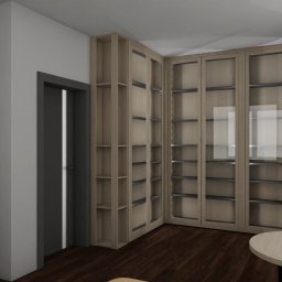 Krzysztof Pęczek, F.H.U. AGMA - Wizualizacja wnętrza: przeszklone szafy w jasnej tonacji, tworzące biblioteczkę, oświetlone wiszącą lampą. Widoczny fragment stołu i podłogi.