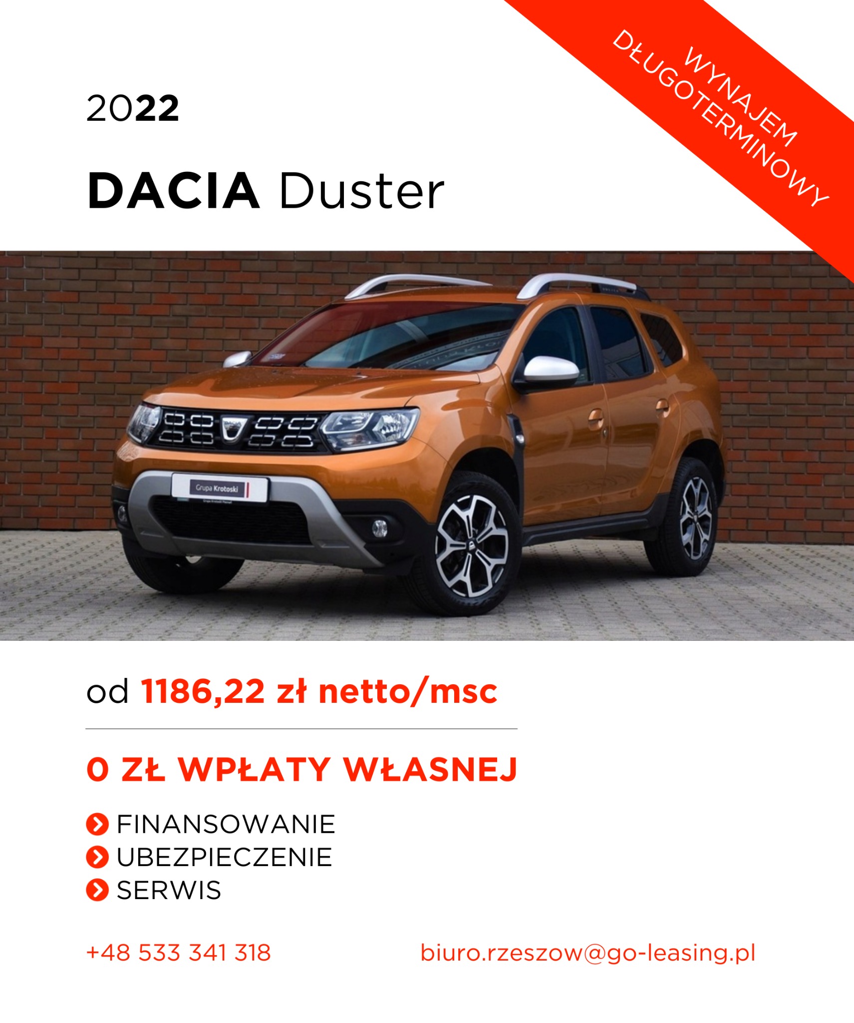 Pomarańczowy Dacia Duster z 2022 roku na tle ceglanej ściany, oferta wynajmu długoterminowego z finansowaniem, ubezpieczeniem i serwisem, bez wpłaty własnej, cena od 1186,22 zł netto miesięcznie.