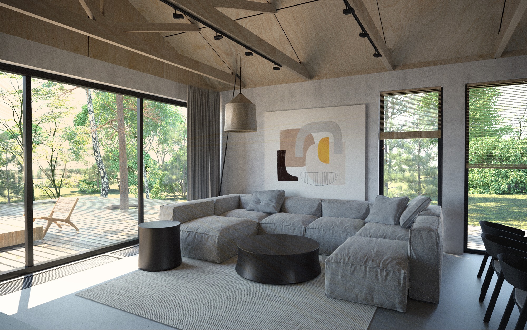 Jasne wnętrze salonu z dużym, modułowym narożnikiem, abstrakcyjnym obrazem na ścianie i widokiem na zewnątrz przez panoramiczne okno z drewnianym tarasem.