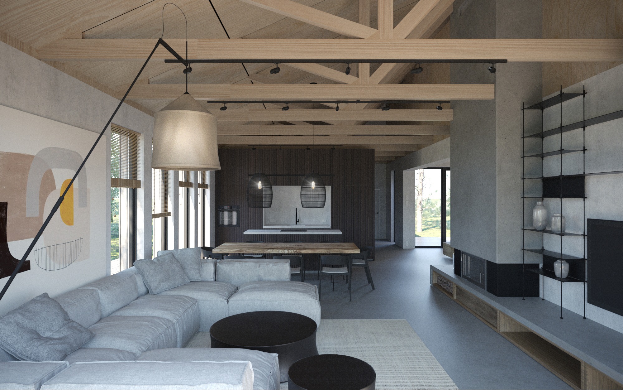 Jasny salon z drewnianą konstrukcją stropu, szarą sofą modułową, okrągłymi stolikami kawowymi i nowoczesnym oświetleniem wiszącym nad stołem jadalnym, widok na kuchnię w tle.