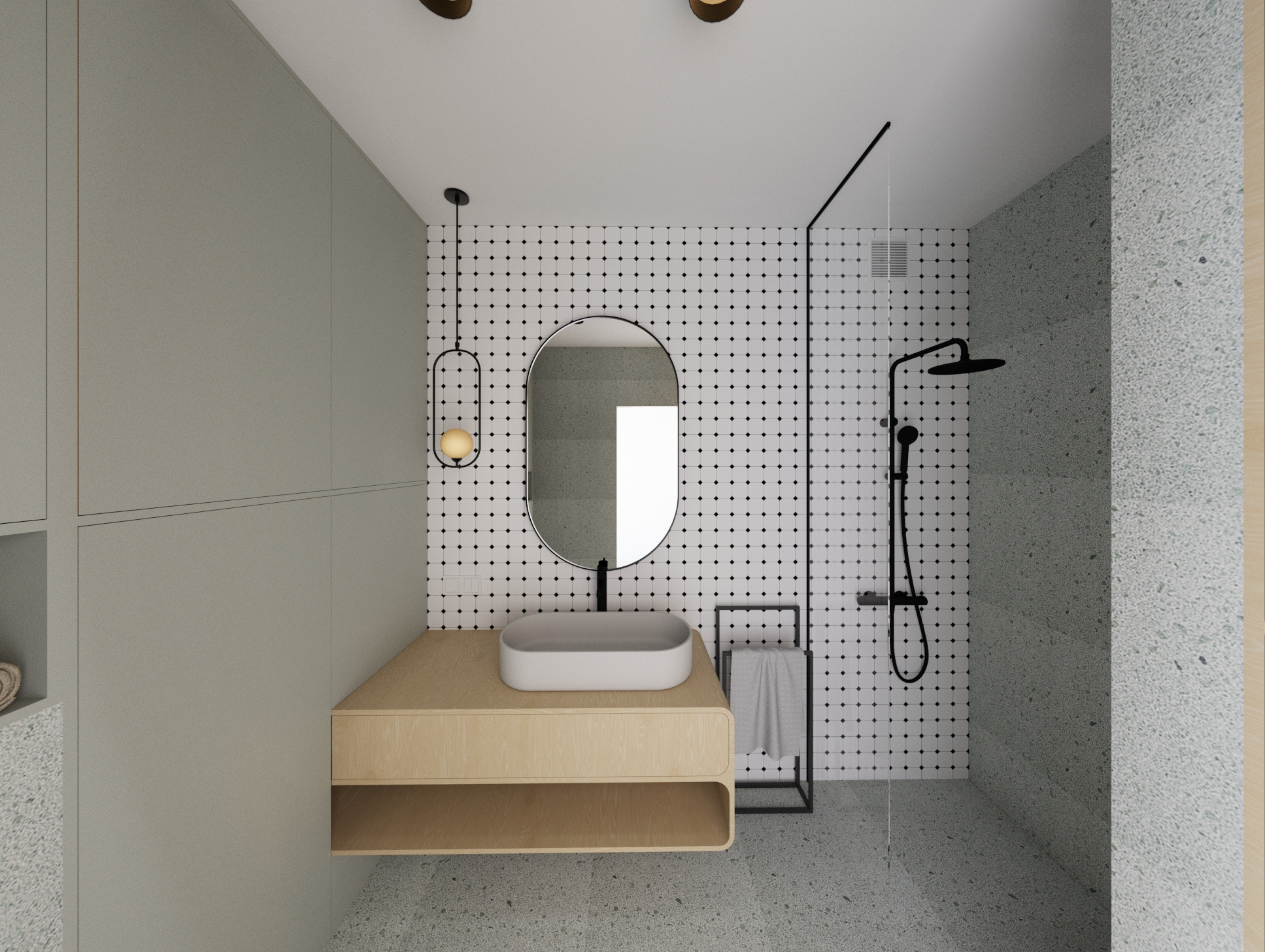 Minimalistyczna łazienka z owalnym lustrem, drewnianą szafką pod umywalką i kabiną prysznicową za szklaną ścianką. Geometryczne płytki i terazzo dodają charakteru.